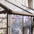 Loberon Gewächshaus Essone, mit Großem Fenster & Seitentüren, Wetterfest & Frostresistent, Authentisches Antik-Design, Gartenzubehör, Outdoor, Eisen, Acrylglas, antikbraun - Thumbnail 6