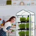 LEADZM Gewächshaus mit UV-beständiger PE-Gitterfolie，4 Metallablagegittern, Sturm-Winterfest, Schutz vor Kälte,Frost, Anzucht für Tomaten & Pflanzen, Balkon Garten (Transparent, 69 x 48 x 157 cm) - Thumbnail 8